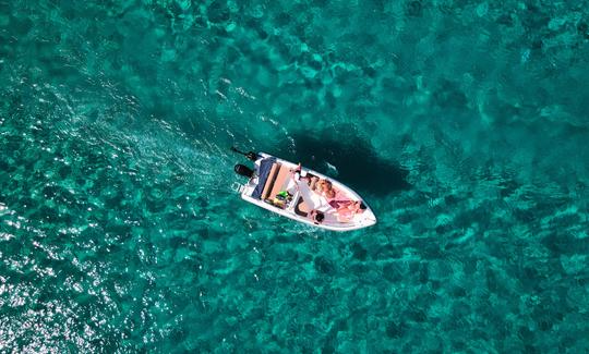 ¡Alquile un barco Nireus de 16 pies sin licencia y explore Rodas!