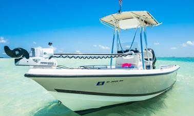 "Piano Piano" Triton 218 Bay Explorer Center Console Rental located in Naples, Florida