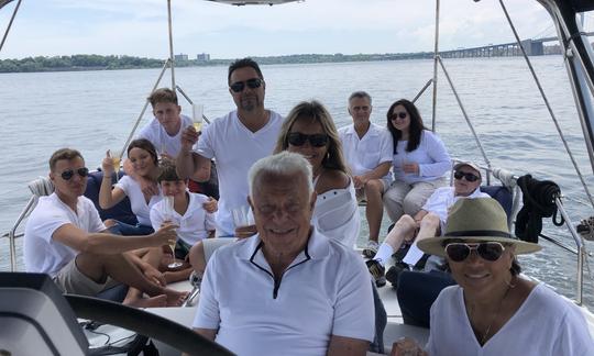 11 Guests Enjoying the Back Deck with grandpa enjoying the Captain‘s Chair