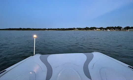 The boat has lights for an evening cruise.