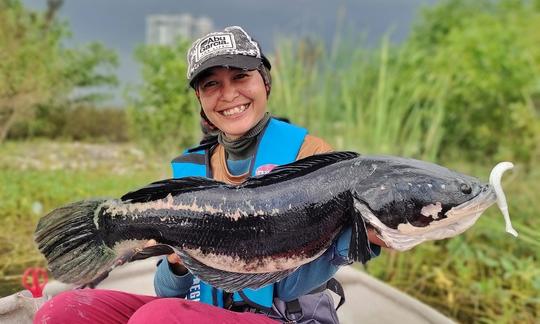 Viagem de pesca urbana de água doce guiada em Kuala Lumpur