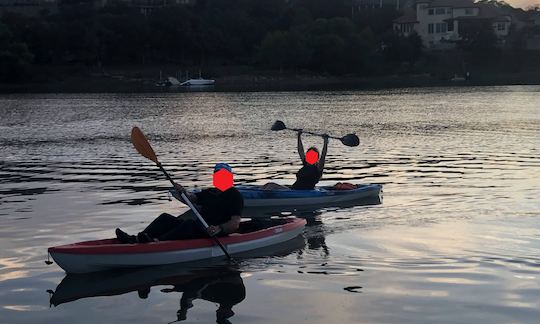 Our two kayaks on the lake - both have fishing pole mounts  behind the seat. Paddles and life jackets included.