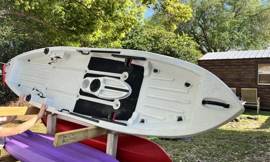 Fishing kayak with raised seat