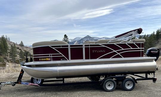 Barco Sylvan Pontoon 2022 para alugar no Lago Holter em Wolf Creek Montana!