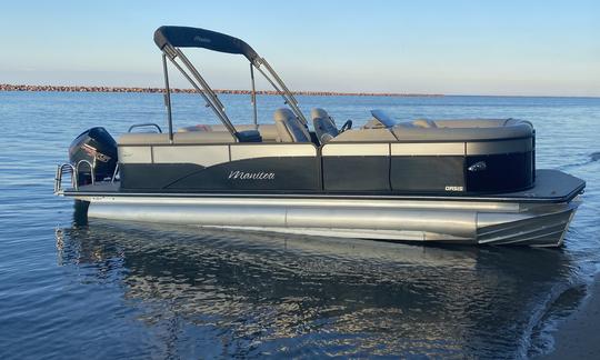 Manitou 23ft Pontoon on the Milwaukee River