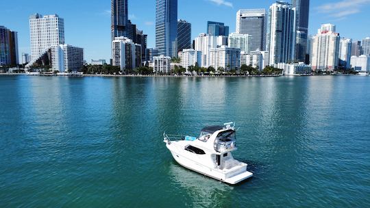 Iate Silverton Flybridge de 41 pés em Miami — Ofertas gratuitas de jet ski!