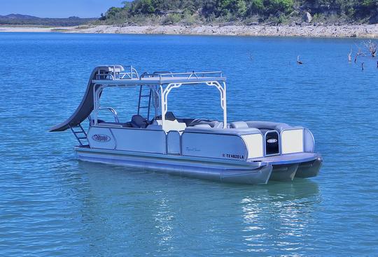 Double Decker Tritoon with Slide in Lake Travis.