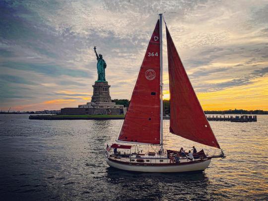 Sail NYC's skyline aboard the Genesis, a beautiful classic sailboat!