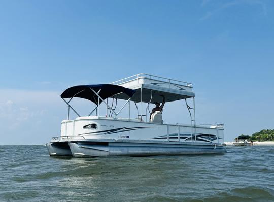 Enjoy coastal cruising at its best on our 27' Crest Pontoon!