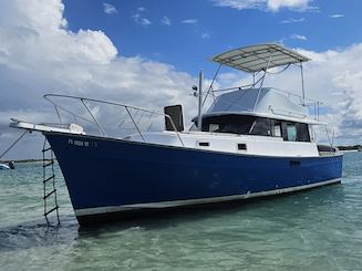 Classic 1979 Mainship Trawler guided river cruise adventure 