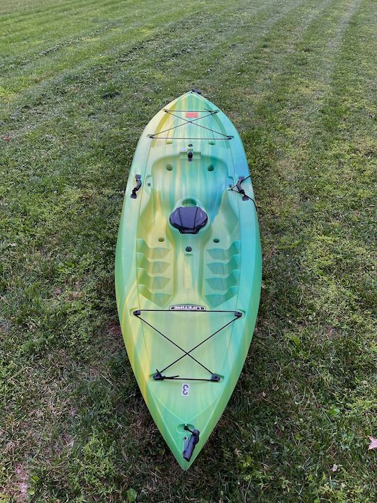 Bold yellow/green 9.5ft sit on top kayak located near Brandywine River