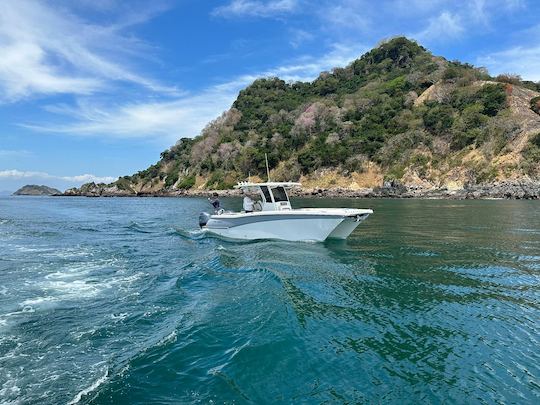 Passeio privado de barco de dia inteiro para Las Perlas e Contadora com a World Cat de 28 pés