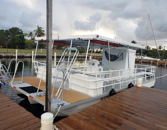 Location avec le capitaine Bibi à Grand Cayman (bateau de plus grande capacité)