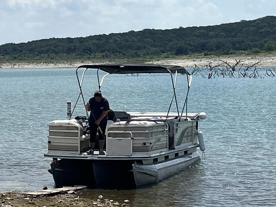 This Sun Tracker Party Barge at Canyon Lake … runs good but upholstery is weak.