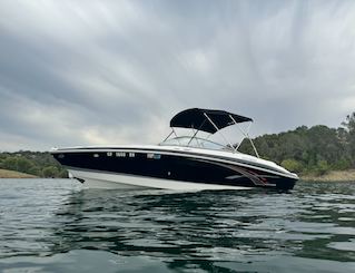 Experience Luxury & Fun on the Water with Our Big Beautiful Boat + Tube & Skis