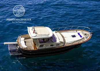 Nacido y criado en Positano, venga a explorar la costa con nosotros y disfrute del barco