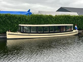 Tour privado en barco por los canales de Ámsterdam