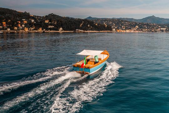 La joya de Portofino: navega con estilo con nuestro barco clásico Ginca