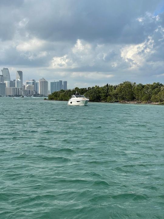 Discover Miami's Charms on Our 45ft Azimut Motor Yacht! 🎸